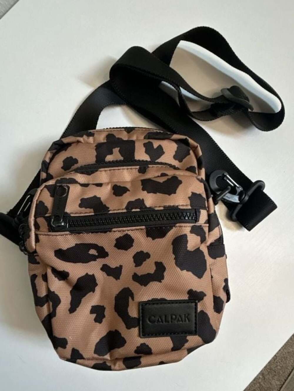 Calpak Stevyn Mini Leopard Print Crossbody Bag